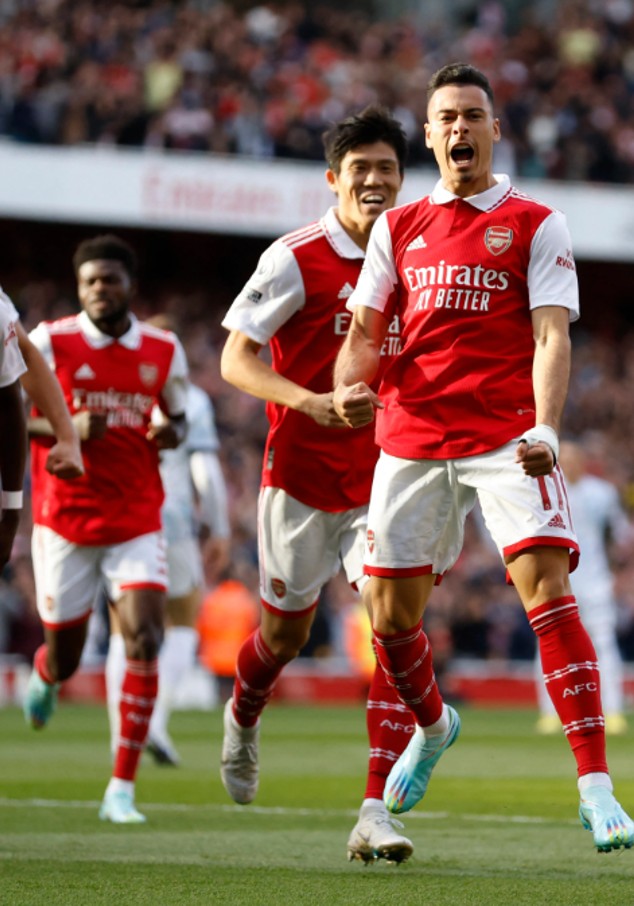Footballers playing in the football field